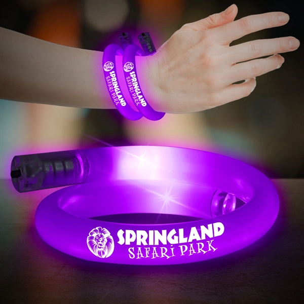 11" plastic coil tube bracelets with flashing LED lights; available in... from ASI 42016 Brighter Promotions Inc