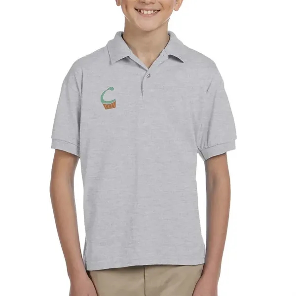 Gildan moisture-wicking cotton / polyester youth polo with two wood-tone button... from ASI 39552 BEL Promo