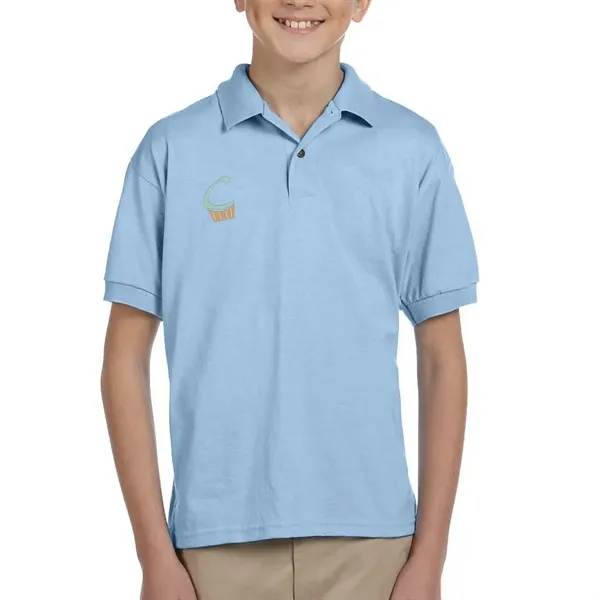 Gildan moisture-wicking cotton / polyester youth polo with two wood-tone button... from ASI 39552 BEL Promo