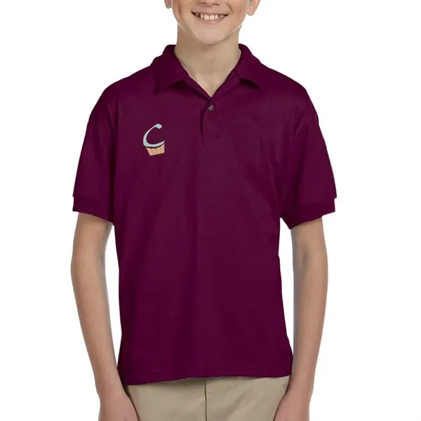Gildan moisture-wicking cotton / polyester youth polo with two wood-tone button... from ASI 39552 BEL Promo
