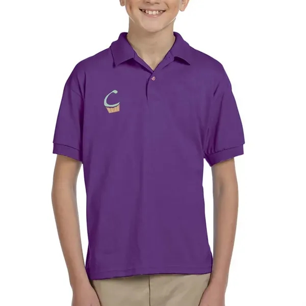 Gildan moisture-wicking cotton / polyester youth polo with two wood-tone button... from ASI 39552 BEL Promo