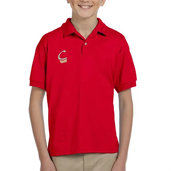 Gildan moisture-wicking cotton / polyester youth polo with two wood-tone button... from ASI 39552 BEL Promo