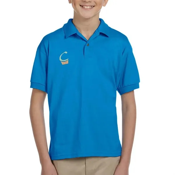 Gildan moisture-wicking cotton / polyester youth polo with two wood-tone button... from ASI 39552 BEL Promo