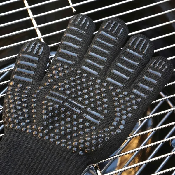 Pair of lightweight heat-resistant cooking gloves with five-finger design.... from ASI 61966 HPG / Beacon Promotions