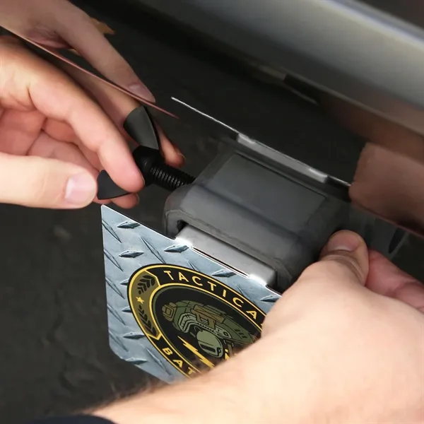 A USA-made stainless steel trailer hitch cover with a foldable design,... from ASI 61966 HPG / Best Promotions USA