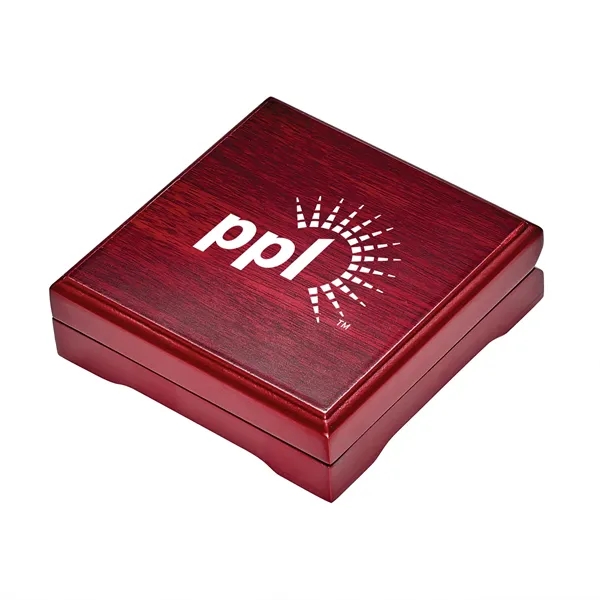 Multi-color desk compass measuring 2" in diameter and sitting inside of... from ASI 46170 Compass Industries Inc