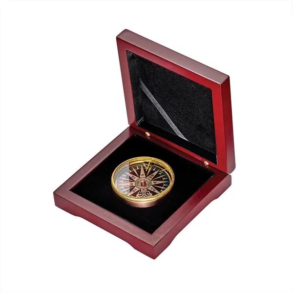 Multi-color desk compass measuring 2" in diameter and sitting inside of... from ASI 46170 Compass Industries Inc