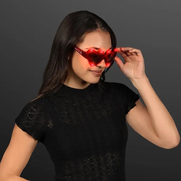Heart shaped lit sunglasses with 10 red LED colors.... from ASI 34194 ALightPromos / Alight Promotional Products