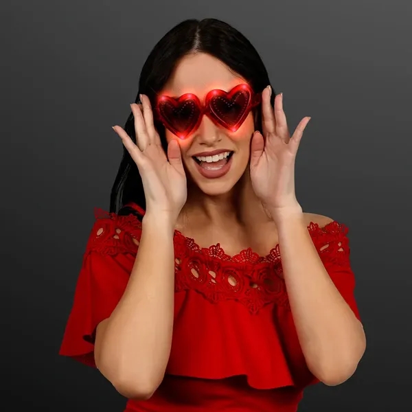 Heart shaped lit sunglasses with 10 red LED colors.... from ASI 34194 ALightPromos / Alight Promotional Products