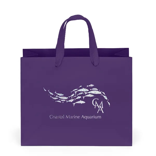 Premium-weight matte-laminated bag with woven handles and fold-over top.... from ASI 37940 Bag Makers Inc