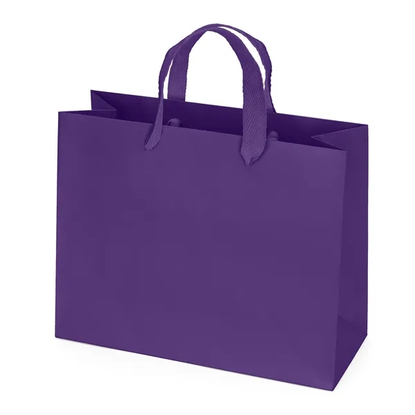 Premium-weight matte-laminated bag with woven handles and fold-over top.... from ASI 37940 Bag Makers Inc