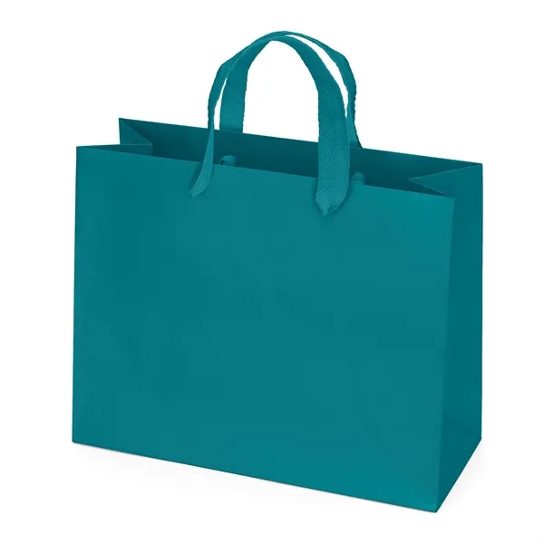 Premium-weight matte-laminated bag with woven handles and fold-over top.... from ASI 37940 Bag Makers Inc