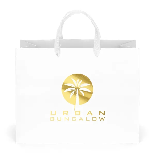 Premium-weight matte-laminated bag with woven handles and fold-over top.... from ASI 37940 Bag Makers Inc