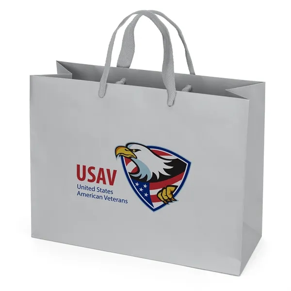 Premium-weight matte-laminated bag with woven handles and fold-over top.... from ASI 37940 Bag Makers Inc