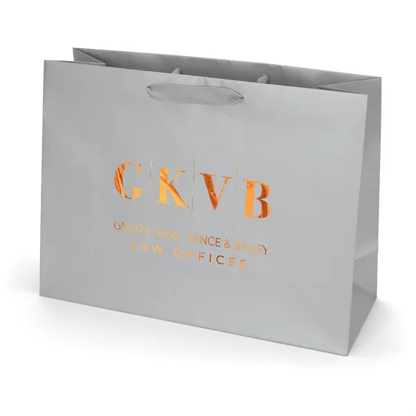 Premium-weight matte-laminated bag with woven handles and fold-over top.... from ASI 37940 Bag Makers Inc