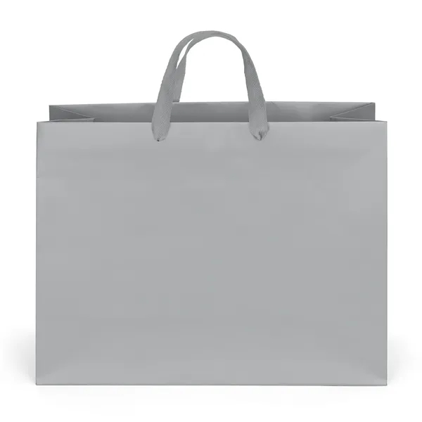 Premium-weight matte-laminated bag with woven handles and fold-over top.... from ASI 37940 Bag Makers Inc