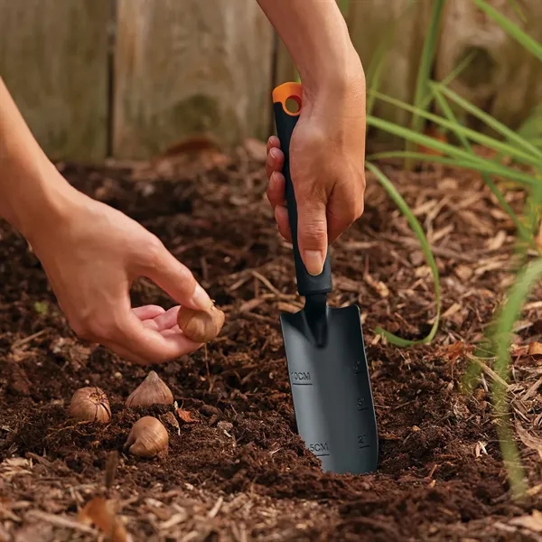 Uproot and relocate plants, and the Trowel to break through the... from ASI 46170 Compass Industries Inc