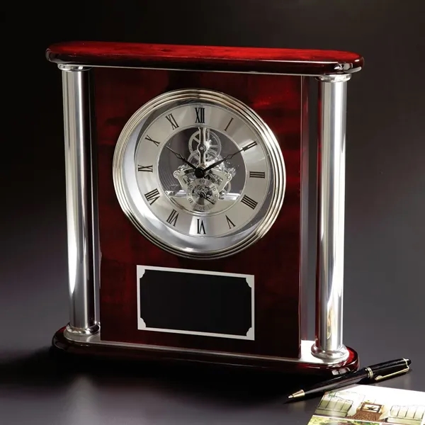 11.5" x 11.25" x 2.5" skeleton clock suspended in rosewood with... from ASI 68507 The Magnet Group / Benchmark Crystal & Clocks