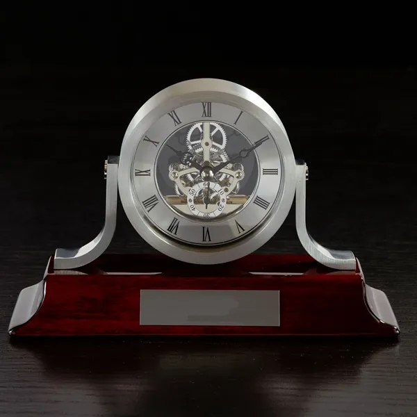 5.5" x 8.5" x 2.5" silver skeleton clock with piano finish... from ASI 68507 The Magnet Group / Benchmark Crystal & Clocks