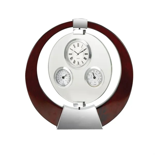 Desk clock designed with gimbaled movement and features a thermometer and... from ASI 68507 The Magnet Group / Benchmark Crystal & Clocks