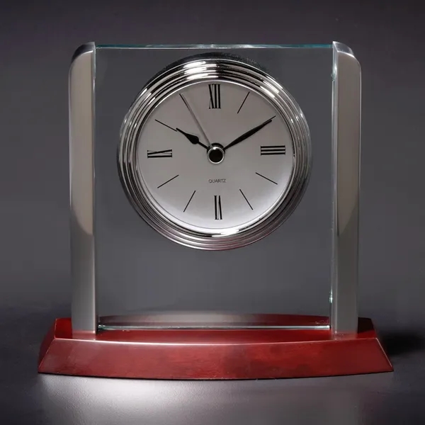 Desk clock featuring a waterfall bezel, acrylic panel, silver posts, rosewood... from ASI 68507 The Magnet Group / Benchmark Crystal & Clocks