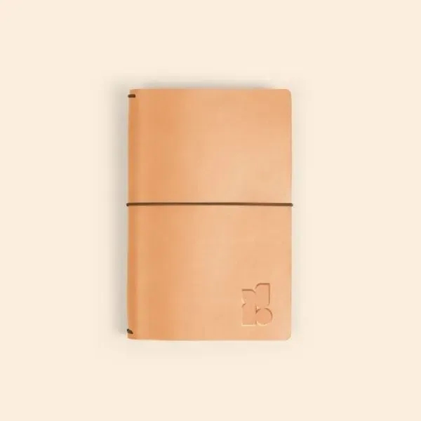 This sleek journal cover features an elastic closure to keep your... from ASI 74710 Numo