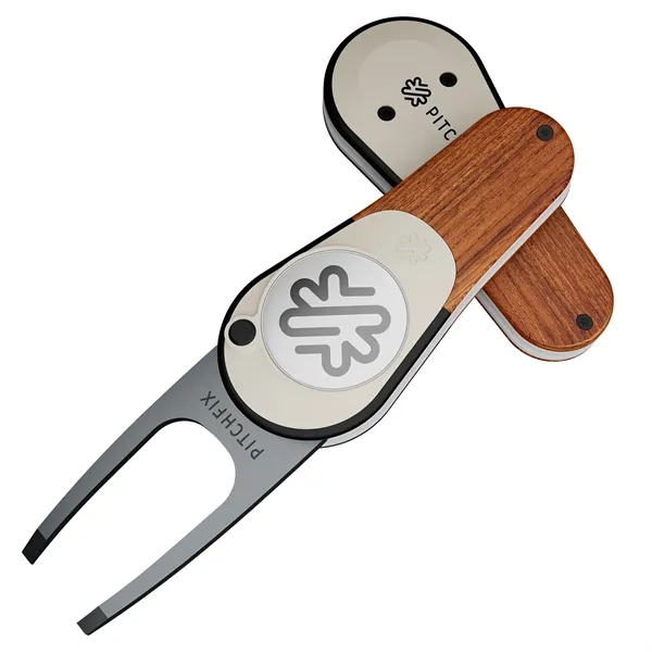 Pitchfix: The Woodie is a premium switchblade divot tool. Wood-effect finish... from ASI 61966 HPG / BCG Creations HPG Gold