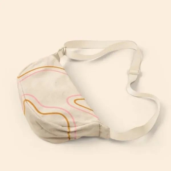 Our Crescent-shaped Luna Sling keeps your everyday essentials close, and your... from ASI 74710 Numo