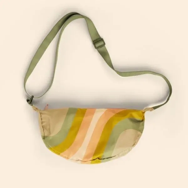 Our Crescent-shaped Luna Sling keeps your everyday essentials close, and your... from ASI 74710 Numo