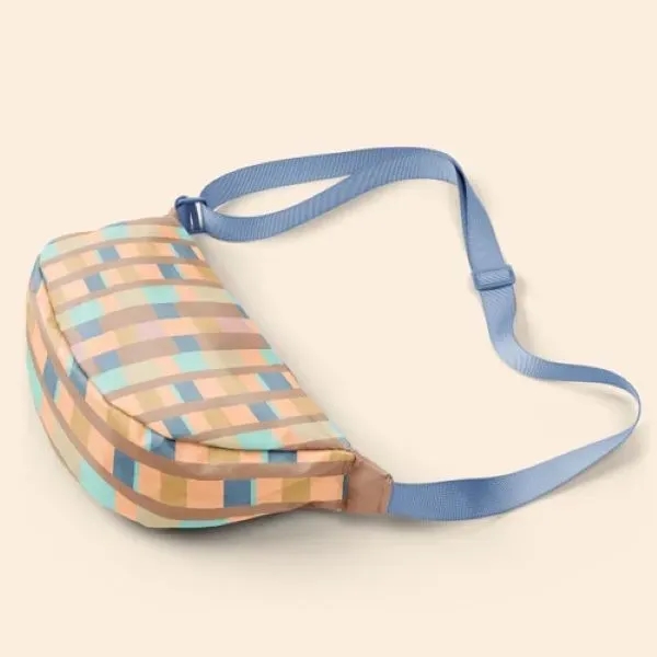 Our Crescent-shaped Luna Sling keeps your everyday essentials close, and your... from ASI 74710 Numo