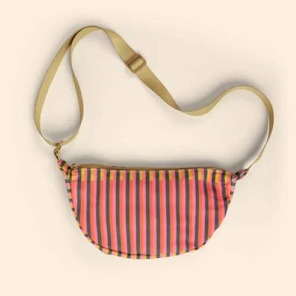 Our Canvas Crescent-shaped Luna Sling keeps your everyday essentials close, your... from ASI 74710 Numo