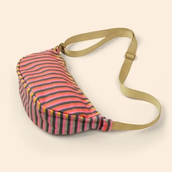 Our Canvas Crescent-shaped Luna Sling keeps your everyday essentials close, your... from ASI 74710 Numo