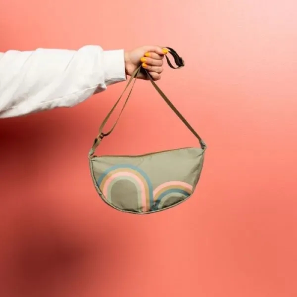 Our Crescent-shaped Luna Sling keeps your everyday essentials close, and your... from ASI 74710 Numo