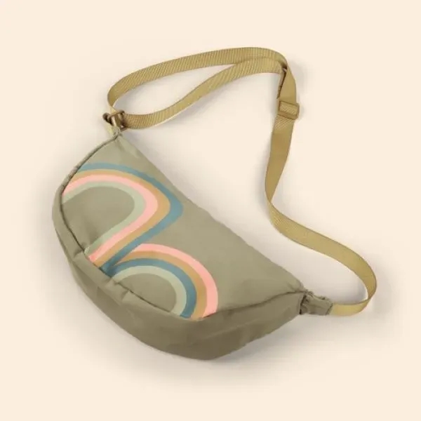Our Crescent-shaped Luna Sling keeps your everyday essentials close, and your... from ASI 74710 Numo