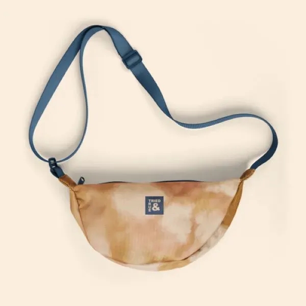 Our Crescent-shaped Luna Sling keeps your everyday essentials close, and your... from ASI 74710 Numo
