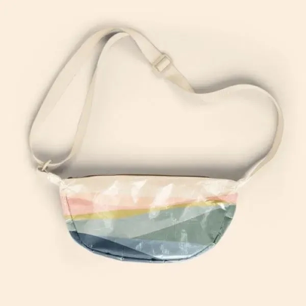 Our Crescent-shaped Luna Sling keeps your everyday essentials close, and your... from ASI 74710 Numo