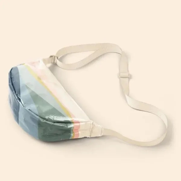 Our Crescent-shaped Luna Sling keeps your everyday essentials close, and your... from ASI 74710 Numo