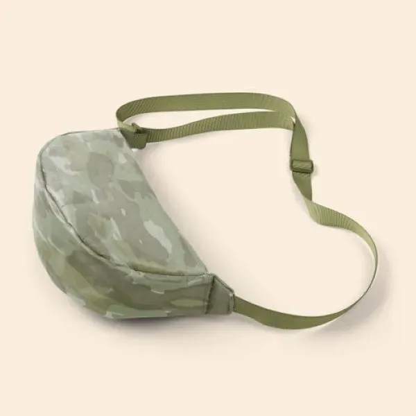 Our Crescent-shaped Luna Sling keeps your everyday essentials close, and your... from ASI 74710 Numo