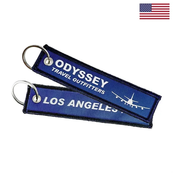 1.125" x 5.25" polyester luggage tag with merrowed edge, grommet and... from ASI 92980 WOV-IN® / Universal Strap/Wov-In Line