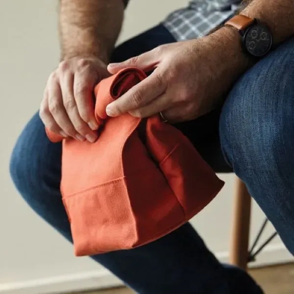 Lunch bag that features a heavyweight canvas exterior and metal snap... from ASI 74710 Numo / City Cut & Sew