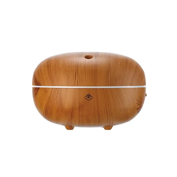 The Macaron Light Wood Ultrasonic Aroma Diffuser fills your space with... from ASI 61005 Hirsch Gift Inc