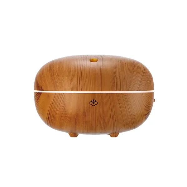 The Macaron Light Wood Ultrasonic Aroma Diffuser fills your space with... from ASI 61005 Hirsch Gift Inc