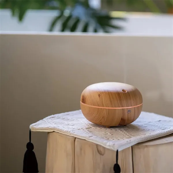 The Macaron Light Wood Ultrasonic Aroma Diffuser fills your space with... from ASI 61005 Hirsch Gift Inc
