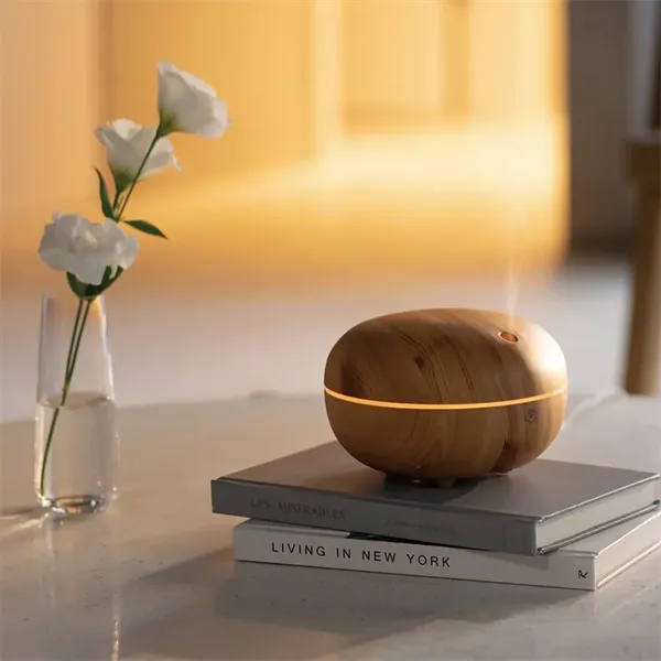 The Macaron Light Wood Ultrasonic Aroma Diffuser fills your space with... from ASI 61005 Hirsch Gift Inc