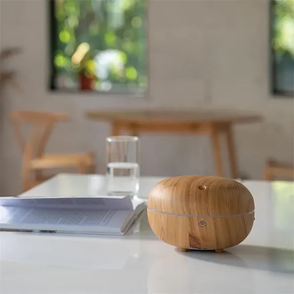 The Macaron Light Wood Ultrasonic Aroma Diffuser fills your space with... from ASI 61005 Hirsch Gift Inc