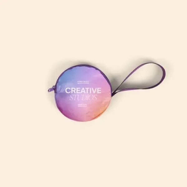 The Pancake To Go has a wristlet strap, this circular pouch... from ASI 74710 Numo