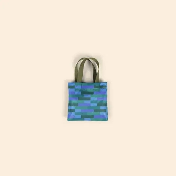 A short, flat tote, the Itty Bitty was designed to simplify... from ASI 74710 Numo