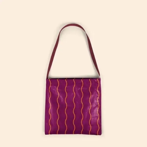 The Sunshine Tote has one long over-the-shoulder strap allowing you to... from ASI 74710 Numo