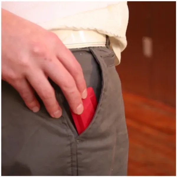 Mini pouch with hole punched, corded ear plugs with chain inserted... from ASI 62786 Intl Molded Pkg / IMPAK™