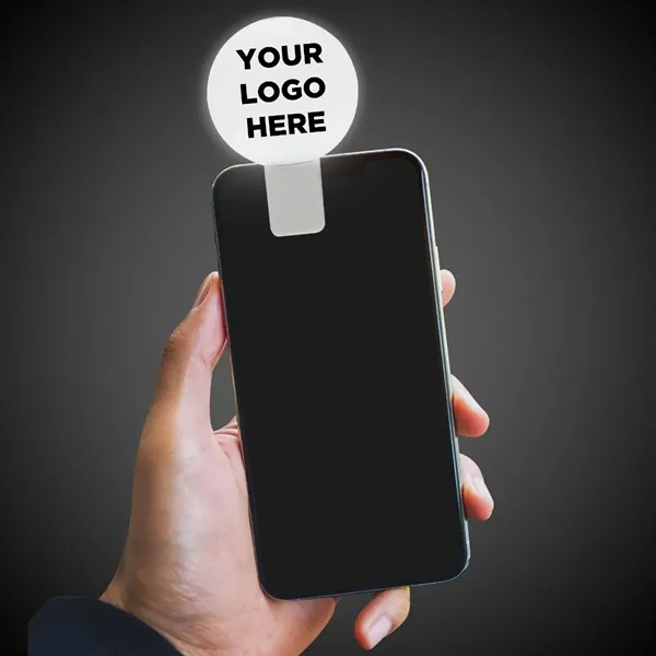 Round white clip-on LED light with 150mAh battery and three flash... from ASI 42016 Brighter Promotions Inc